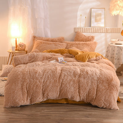 Fluffy peach-colored bedding set on a bed in a cozy bedroom.