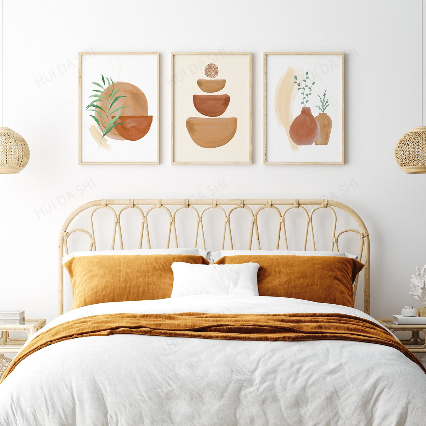 Bedroom with a gold headboard, white bedding, and orange pillows with wall art featuring terracotta pots and plants.