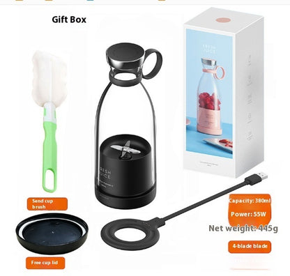 Black electric cup with accessories and packaging on a white background