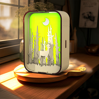 Decorative night light with deer design on a wooden base