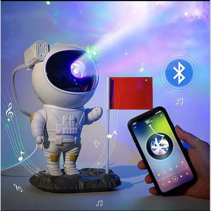 Toy astronaut with Bluetooth connection and smartphone app control against a colorful space-themed background.