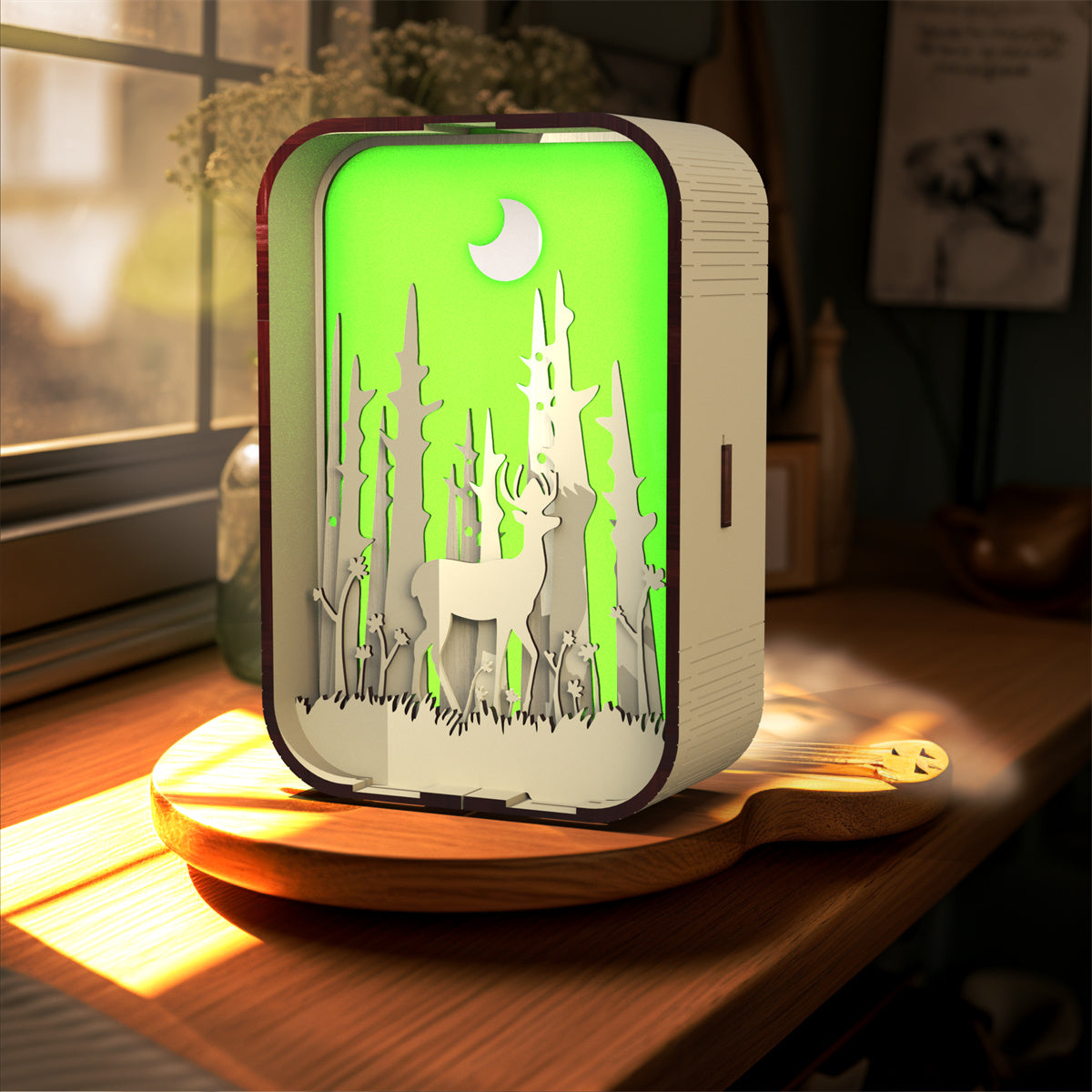 Decorative night light with deer design on a wooden surface
