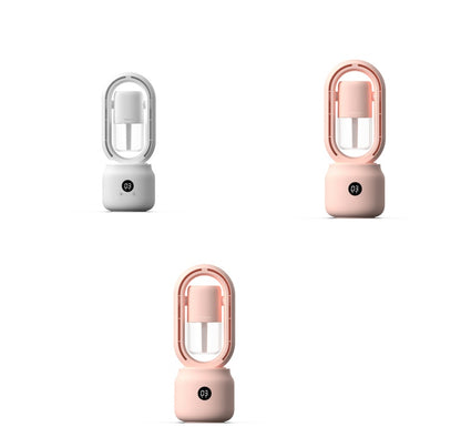 Three portable lamps in white, gray, and pink on a white background