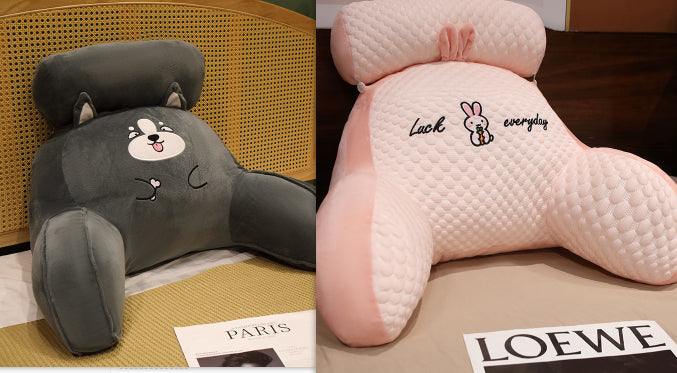 Two cartoon-themed backrest pillows on a chair with visible brand names.