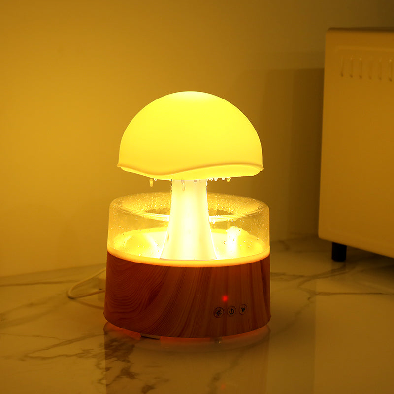 Small lamp with a yellow light on a reflective surface